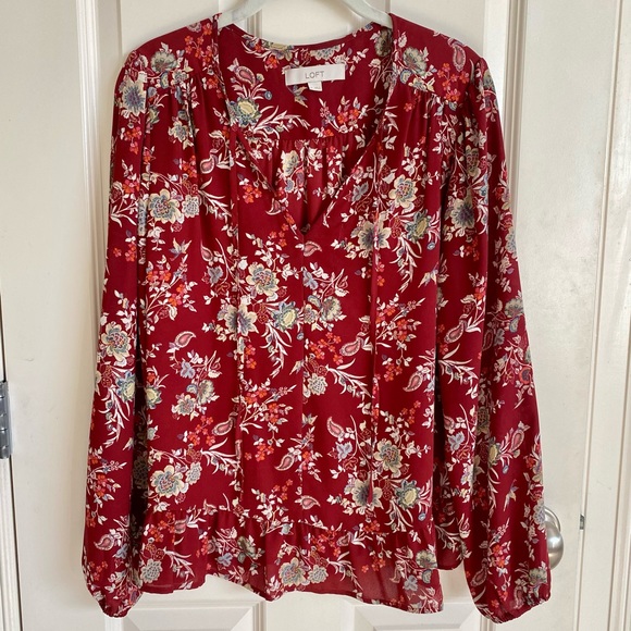 LOFT Tops - LOFT long sleeve blouse with a peplum style & front tie neck. Size-Medium